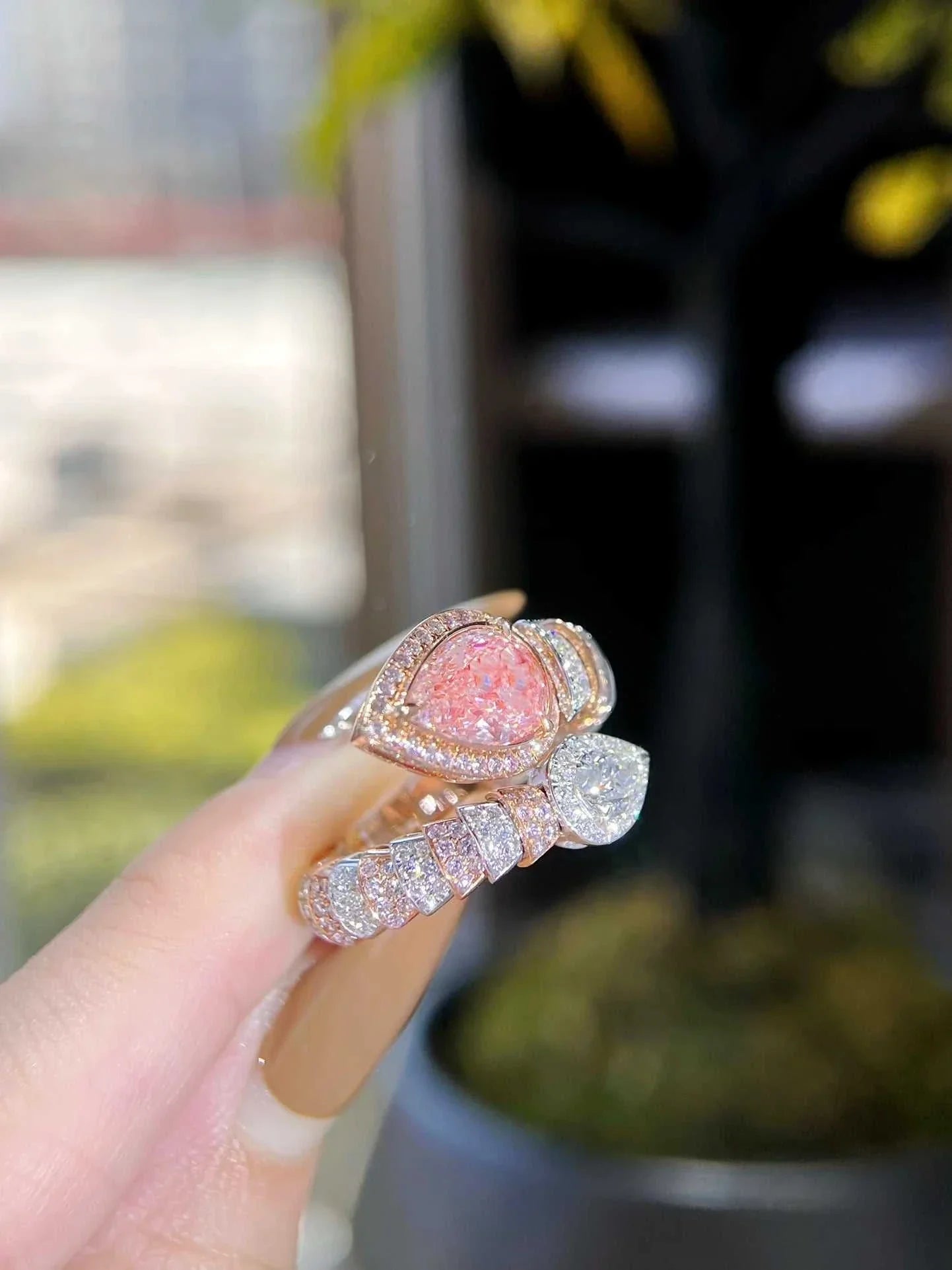 The Emberheart Covenant 2.03CT GIA fancy brown pink diamond ring in 18K gold with intricate design and sparkling diamonds