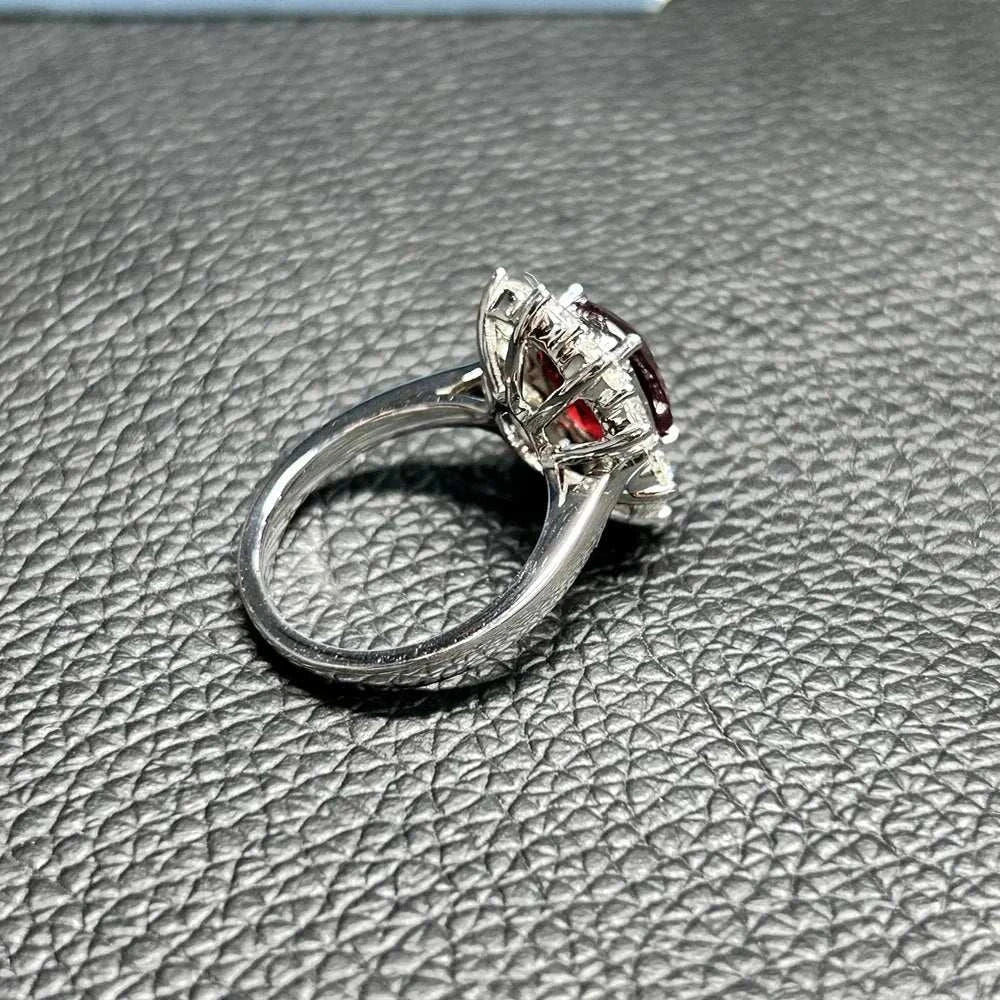 18K white gold ring featuring a 3 carat Mozambique ruby and G VS diamonds