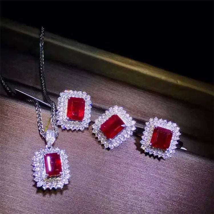 18k gold bridal set with pigeon blood rubies and diamonds, Crimson Legacy collection.