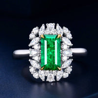 The Enchanted Verdant Oath 18k gold ring with 1.32ct natural Afghan emerald surrounded by diamonds