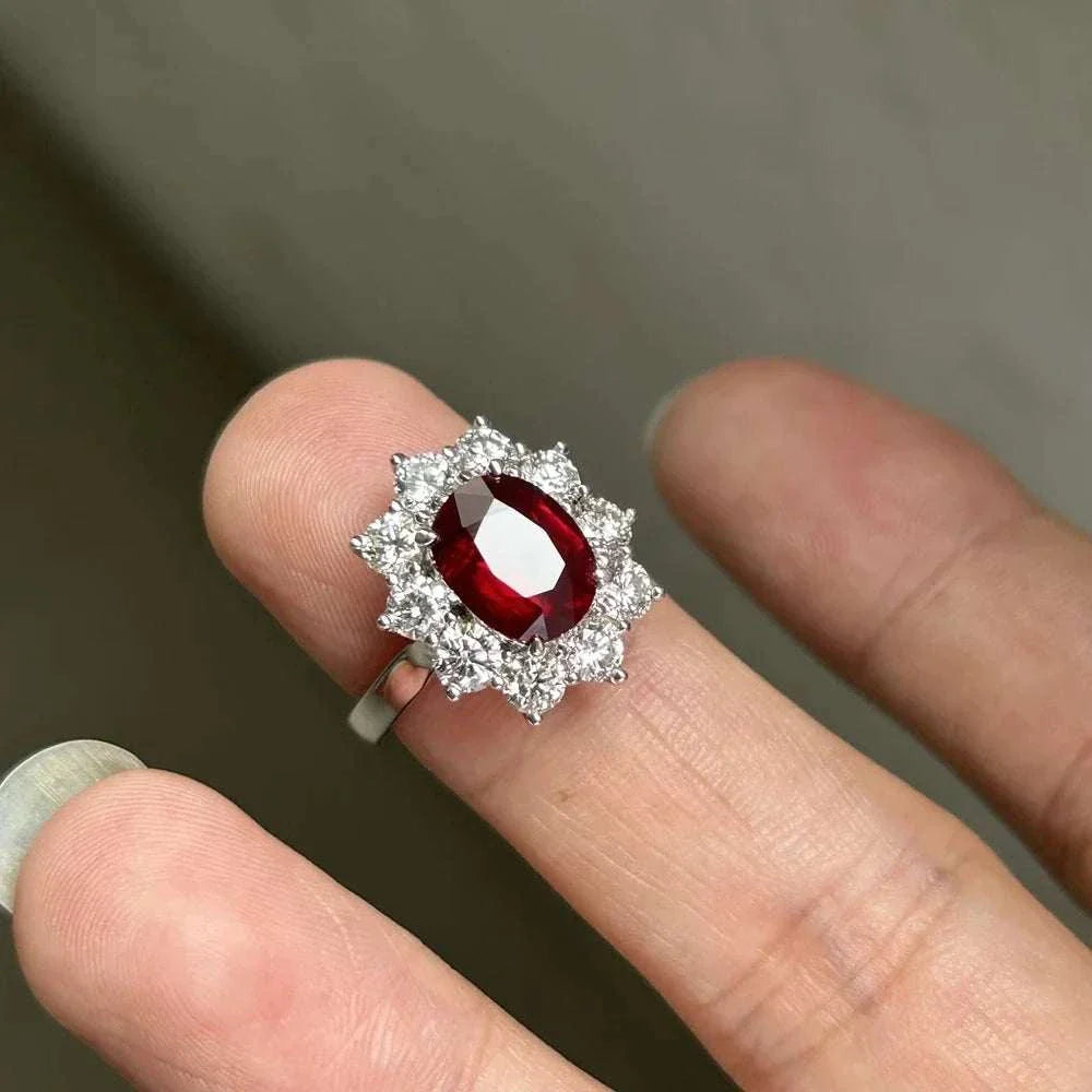 3 carat Mozambique ruby ring with white gold and diamond halo setting