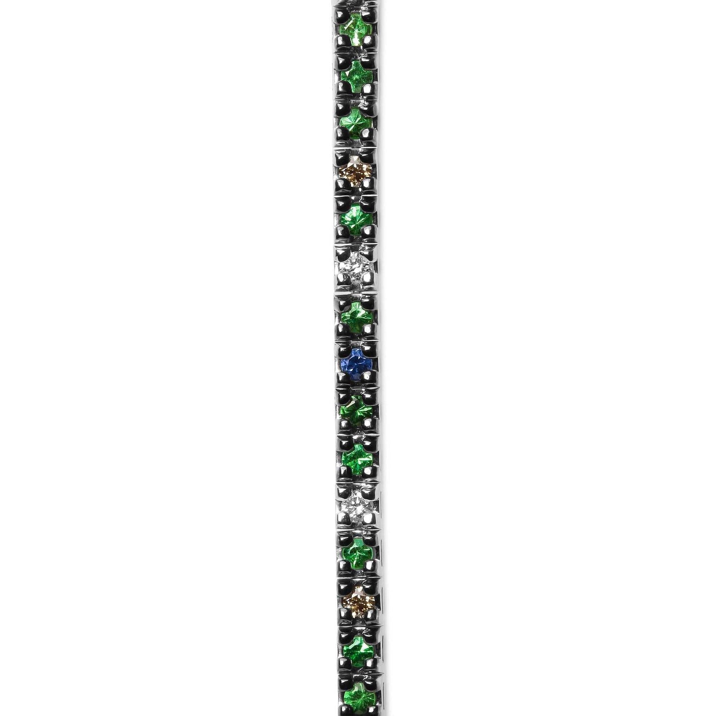 Blue and green gemstone tennis bracelet in 18K white gold with blue sapphires, green tsavorites, and small white and brown diamonds