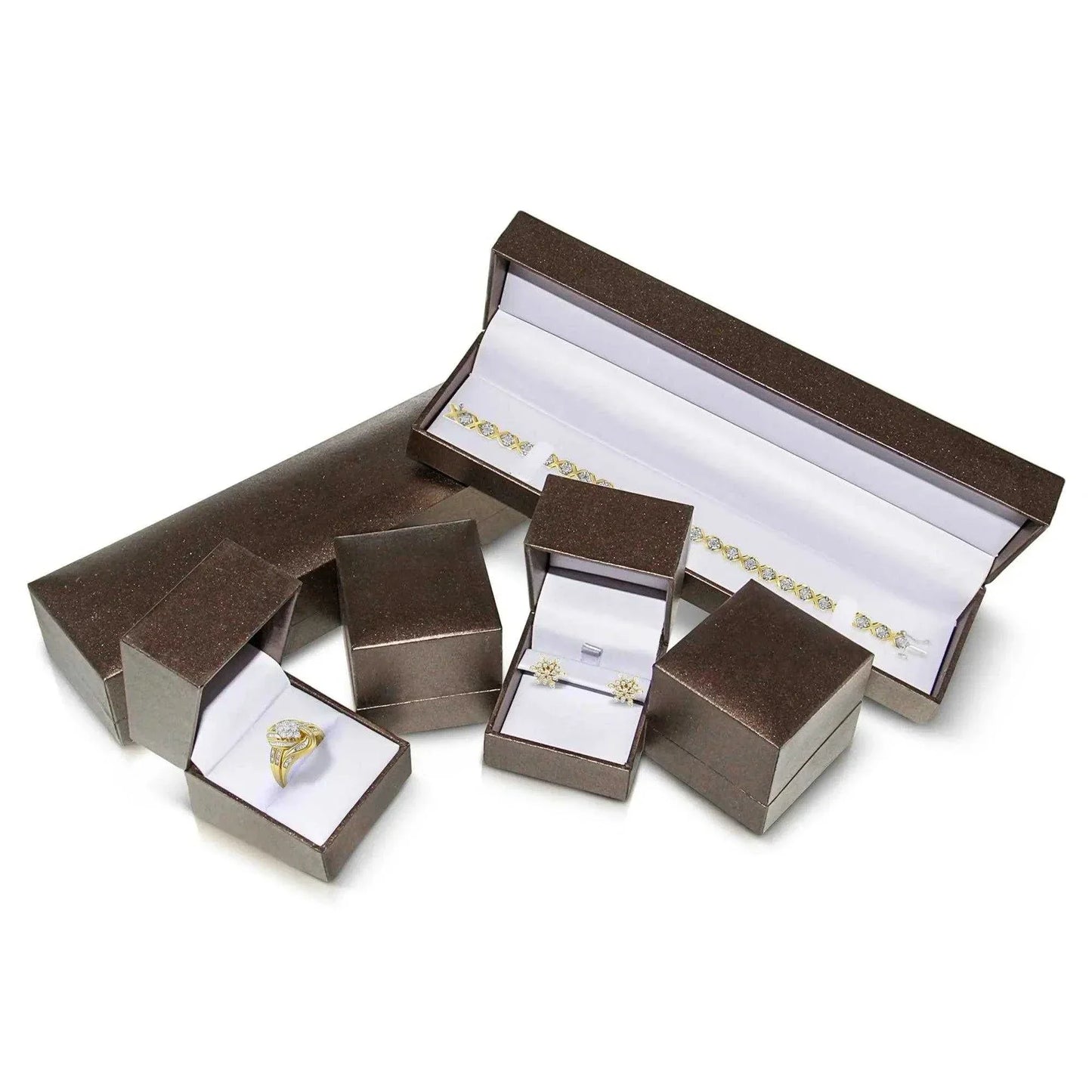 Princess Diamond Tennis Bracelet in 14K white gold with G-H color VS1-VS2 clarity princess cut diamonds in a secure box clasp, displayed in jewelry boxes