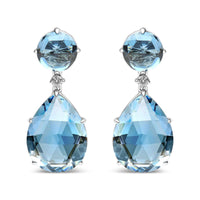 18K white gold earrings with round London Blue Topaz, 1/5 cttw diamonds, and pear-cut Sky Blue Topaz gemstones
