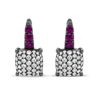 Round diamond and graduated red ruby drop earrings in black rhodium plated 18k white gold with lever backs.