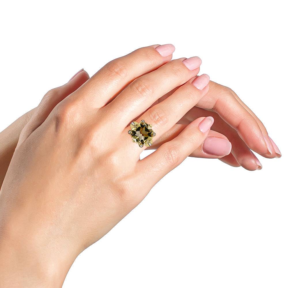 Diamond accented cocktail ring with lemon quartz and white diamonds in 18K yellow gold on hand