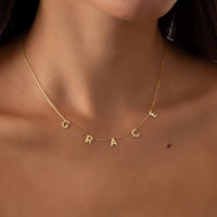 Gold Eldritch Rune Name Talisman necklace spelling "GRACE" on adjustable O-chain