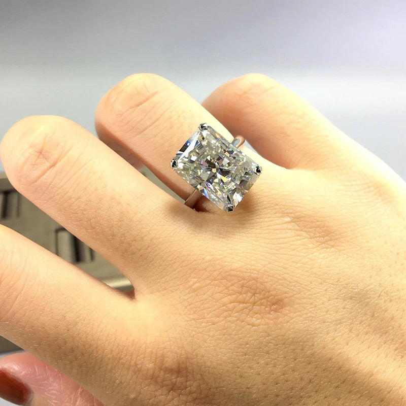 Solid 18K AU750 white gold ring with a large radiant-cut moissanite gemstone worn on a finger