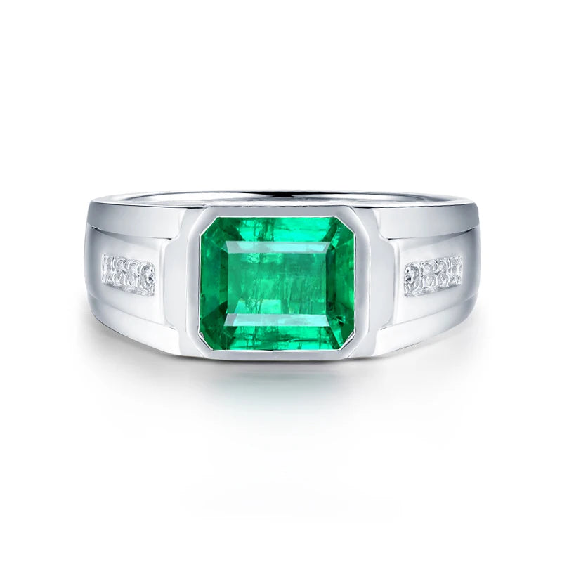 Solid 18k white gold men's ring with natural emerald and diamond accents, emerald cut design