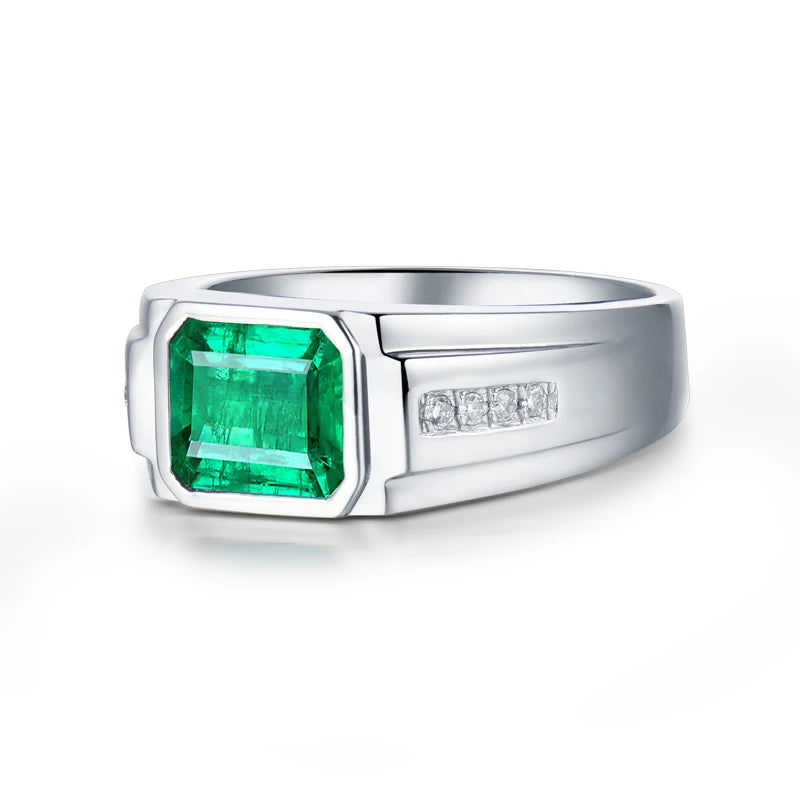 Solid 18k white gold men's ring with natural emerald center and diamond accents
