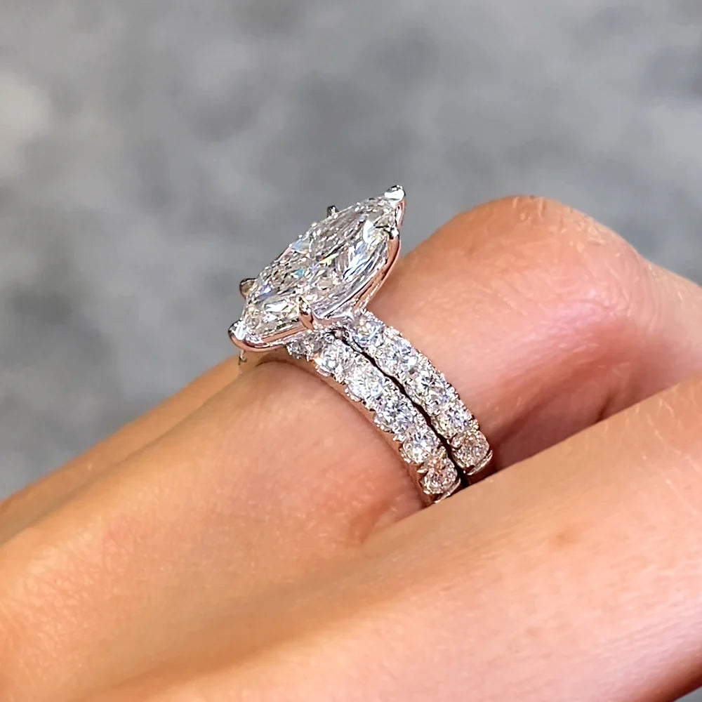 Star-Forged Promise marquise-cut diamond engagement ring with matching white-gold bridal band, luxurious and ethically sourced wedding set