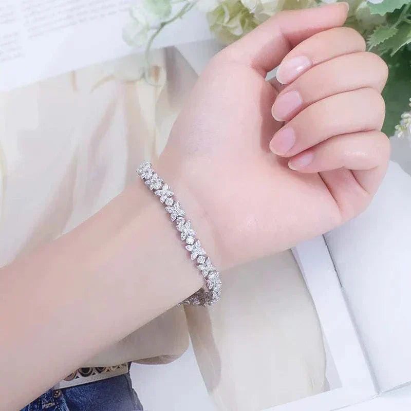Elegant 14k gold and diamond Cuban bracelet named Frostforged Chain of the Titan worn on wrist