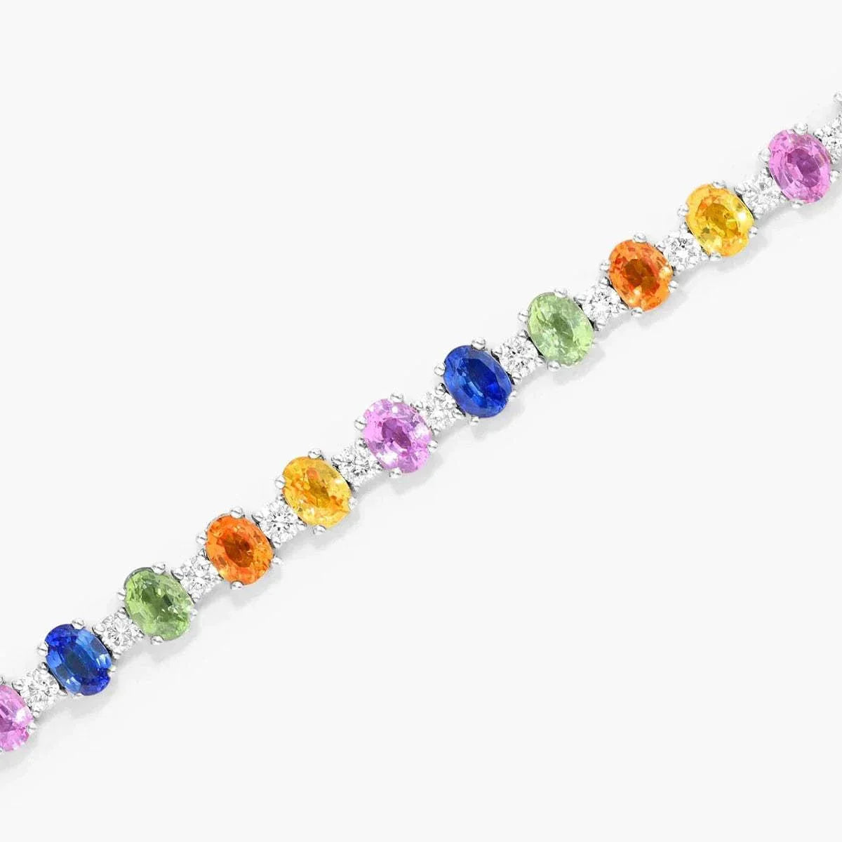 Bracelet of the Emerald Guardians with multicolored oval gemstones and sparkling diamonds in a silver setting