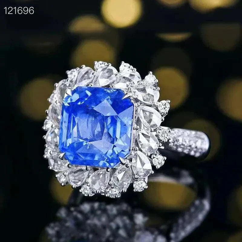 18K gold ring with 8.24 carat Sri Lanka natural royal blue sapphire surrounded by large diamonds