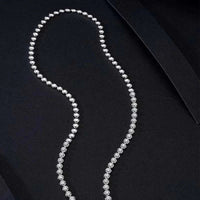 European and American trend ins bubble large set chain necklace with 18k gold and 3.951 carat natural diamond pendant on a black background