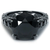 7.05 carat certified natural black diamond engagement ring in 14K black gold with side black diamonds and white micro pave diamonds