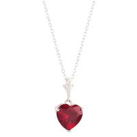 Heart-shaped ruby pendant in sterling silver necklace inspired by magical love and courage
