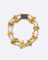 Thalindor's Draconic Forge Links gold nugget double cable chain bracelet with rough gold nuggets and ornate clasp.