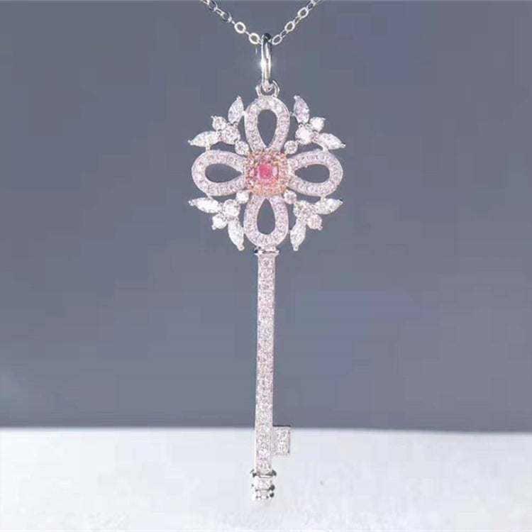 0.13ct Natural Pink Diamond 18k gold key-shaped women's necklace with intricate design and sparkling diamonds