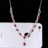 SGARIT Joyas De Boda 18k gold necklace with 7.5ct unheated genuine red ruby gemstones, luxury custom bridal jewelry.