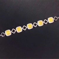 Luxury Wedding 18k gold bracelet with 0.861ct natural yellow diamonds and intricate design