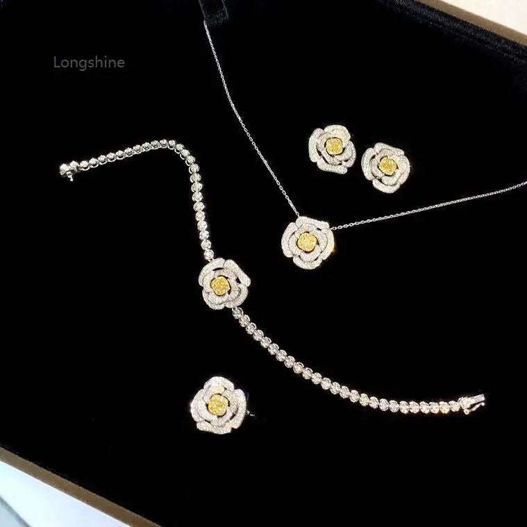 Valentine Love Serial Rose Jewelry Set featuring gold and diamond rose-shaped earrings, necklace, and bracelet in a black display box