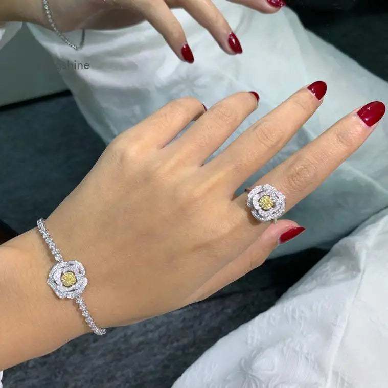 Valentine Love Serial Rose Jewelry Set featuring diamond rose ring and matching bracelet on hand with red manicure