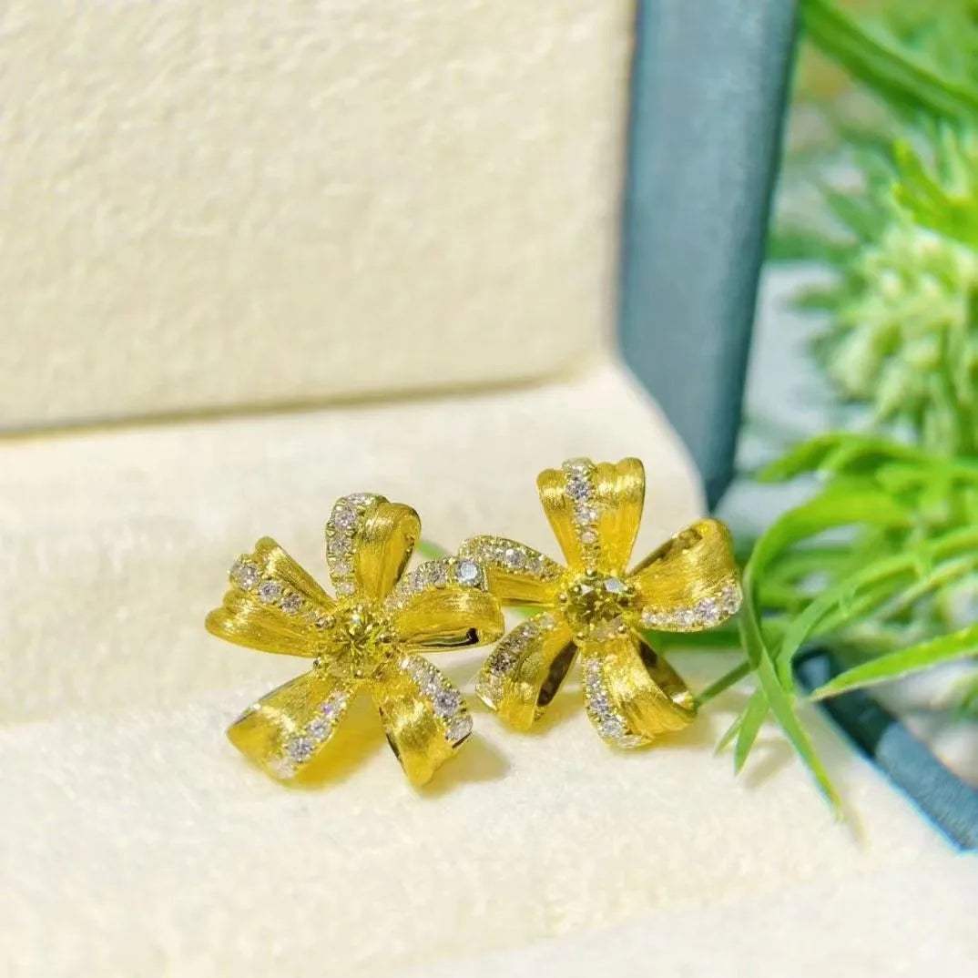 Natural yellow diamond floral stud earrings in 18K gold with 0.39ct diamonds