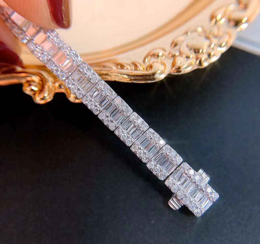 Natural Diamond iced out tennis bracelet in 18K solid gold with sparkling rectangular diamonds and secure clasp