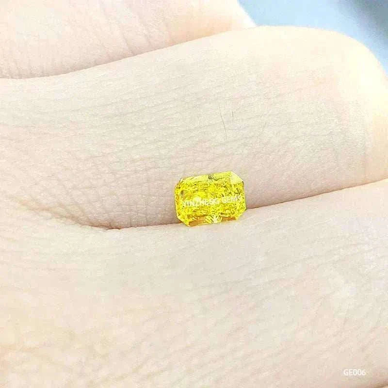 3.55 carat fancy vivid yellow Aurelion Shard lab-grown diamond on fingertip