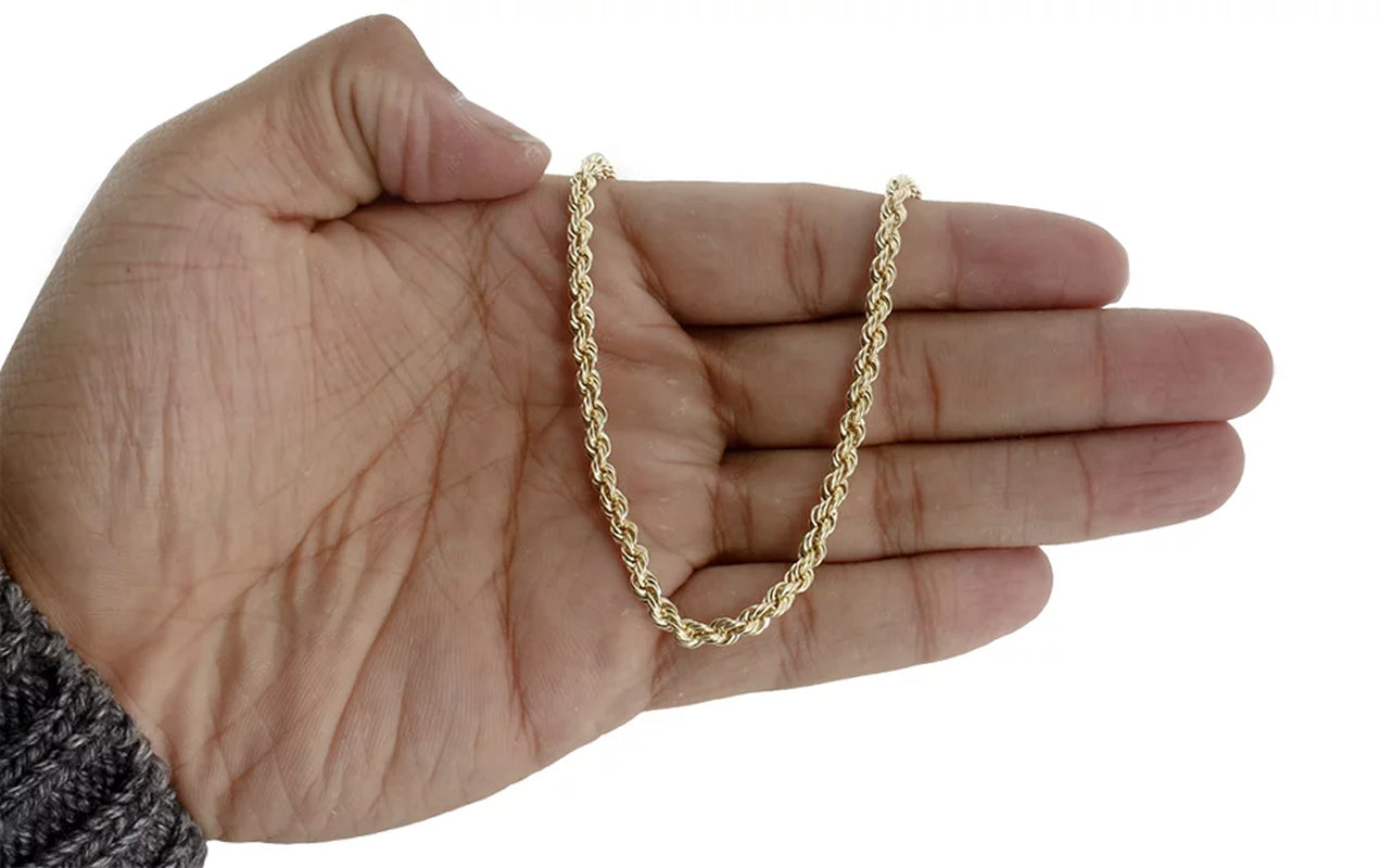 18K yellow gold 4mm solid rope chain necklace displayed on hand