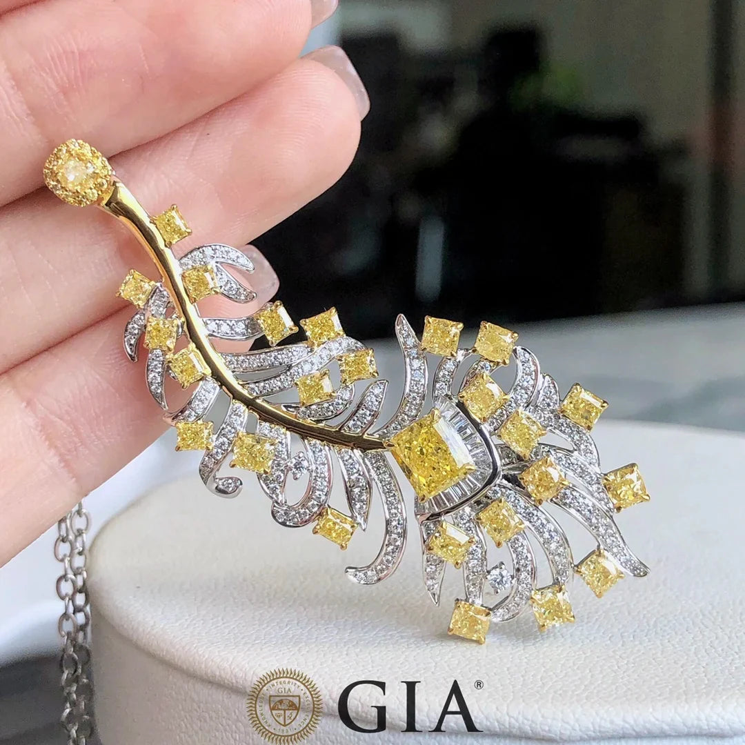 Sun-Enchanted Elven Brooch in 18K white gold with 0.73 ct natural yellow diamonds, handcrafted elven leaf design, luxury fantasy jewelry accessory.