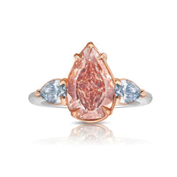 Pink pear diamond three stone ring in white gold with 2.0CT pink lab grown pear-shaped center diamond and two light blue pear-shaped side diamonds