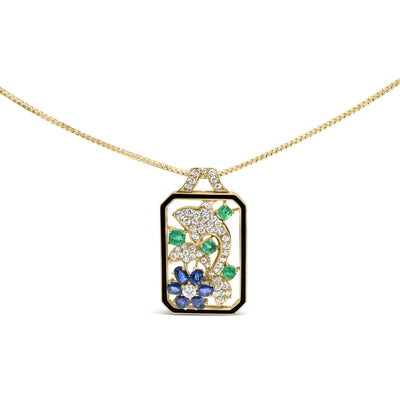 18K yellow gold Oceanheart Sigil pendant with diamond-studded dolphin, sapphires, and emeralds on an 18-inch chain
