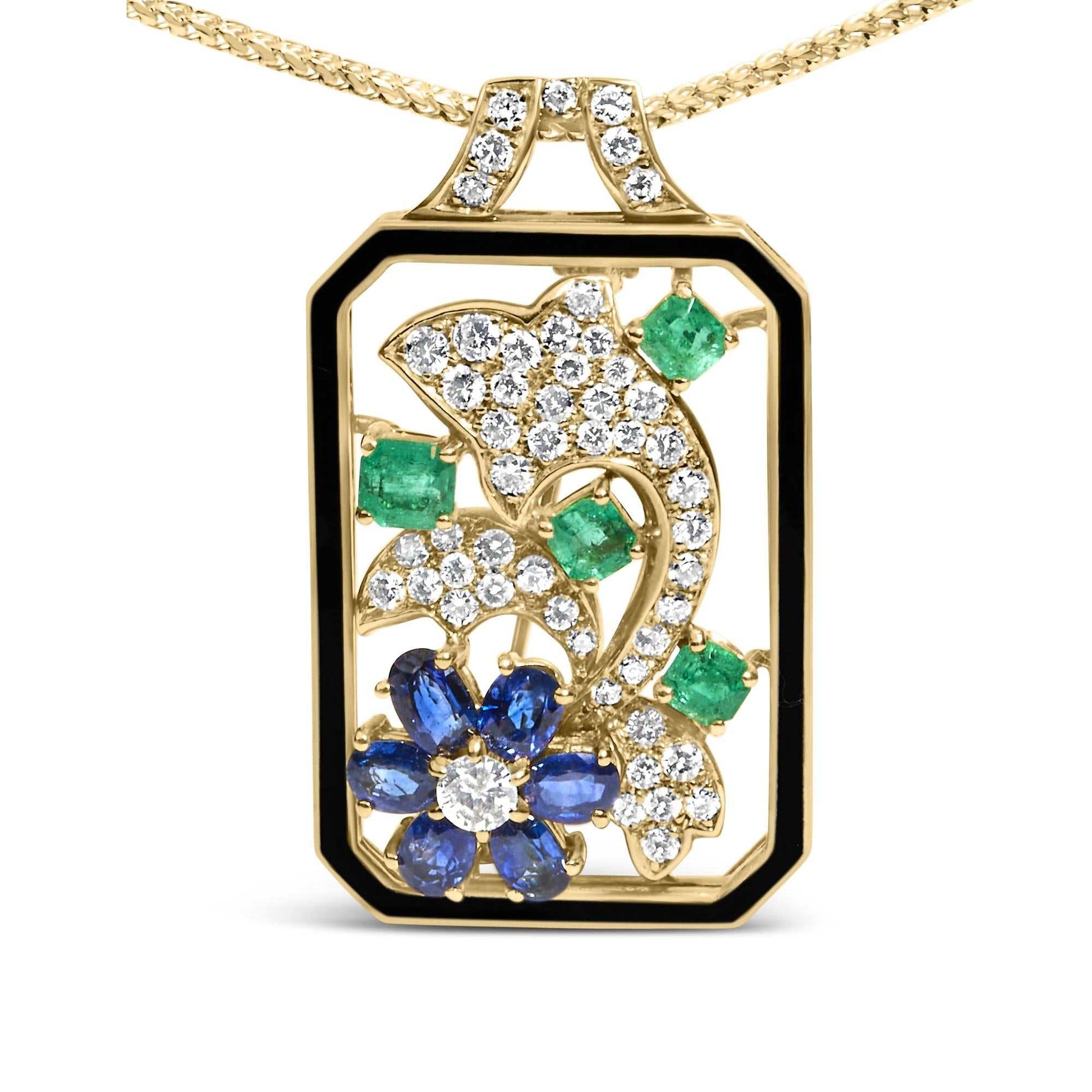 18K yellow gold Oceanheart Sigil pendant with diamond-studded dolphin, blue sapphires, and emerald accents.