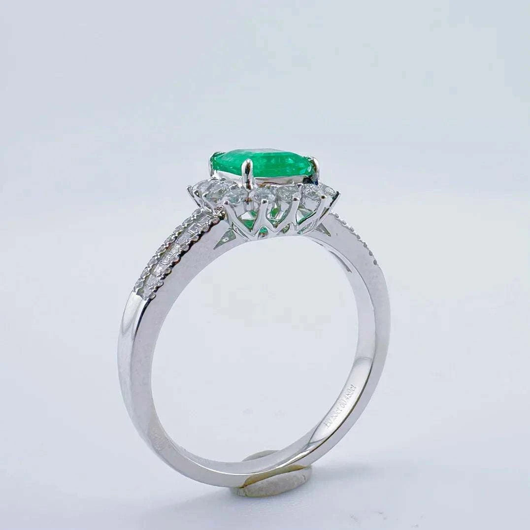 GUILD25 men's fine ring with 0.83ct natural green emerald set in 18K gold with diamond accents