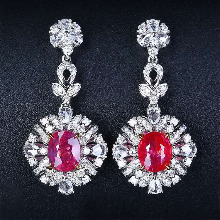 The Tears of the Firebird 18k gold drop earrings with 2.31ct untreated red rubies surrounded by sparkling diamonds