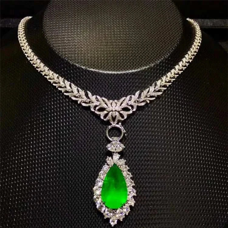 18K gold necklace with pear-shaped 12.78ct green emerald pendant surrounded by diamonds, Heart of the Enchanted Forest design