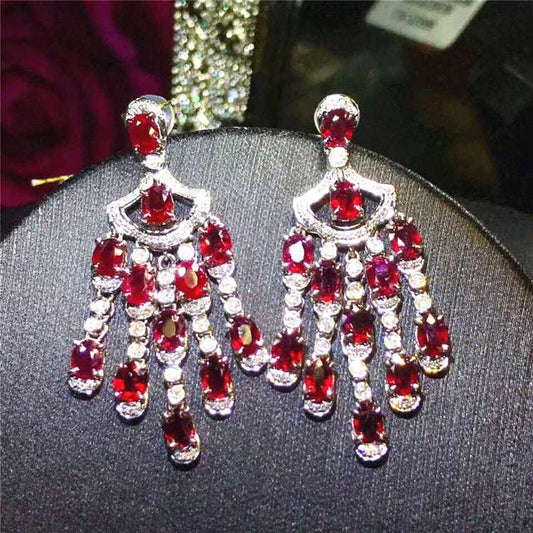 Pair of 18K white gold Elven Queen’s Yulefire Tassel Ruby Earrings accented with 6ct natural rubies and sparkling diamonds