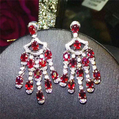 Pair of 18K white gold Elven Queen’s Yulefire Tassel Ruby Earrings accented with 6ct natural rubies and sparkling diamonds