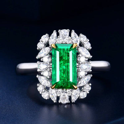 The Enchanted Verdant Oath 18k gold ring with 1.32ct natural Afghan emerald surrounded by diamonds