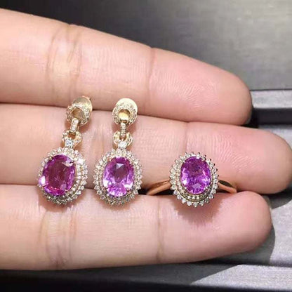 18K gold earrings and ring set with natural pink sapphires surrounded by diamonds