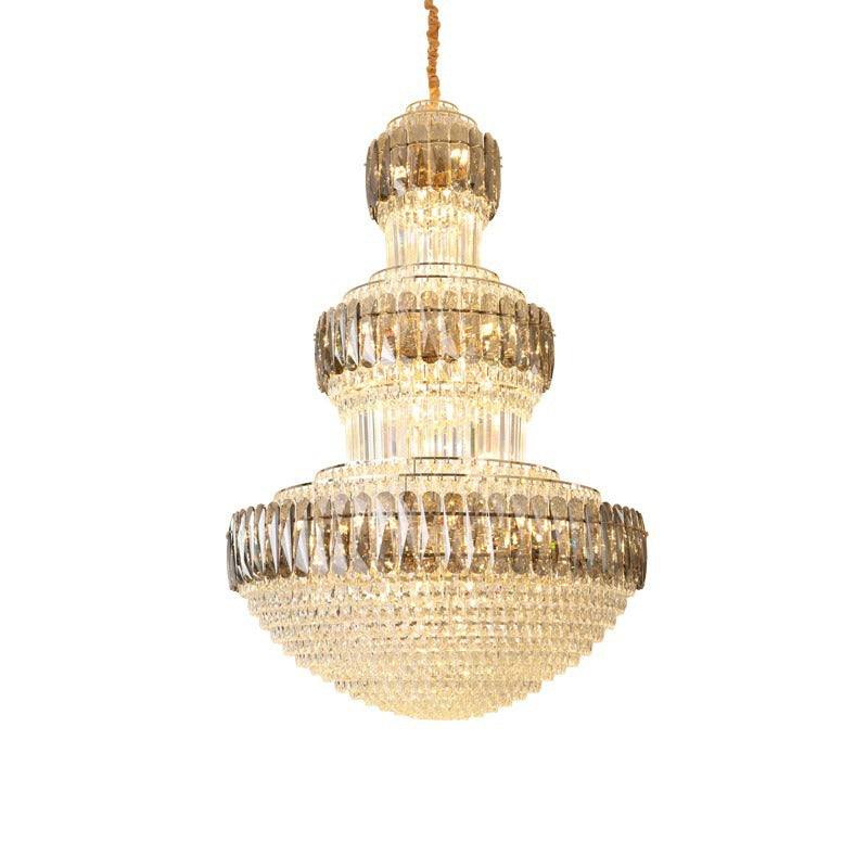 Elegant Celestial Crown of Eärendil™ grand chandelier with cascading crystal tiers and golden accents, inspired by mythical legends.