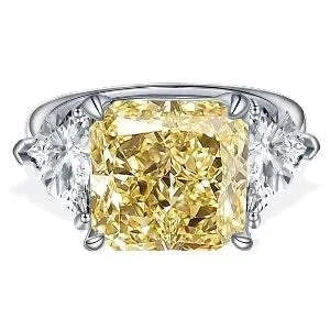 The Laurelin Sunstone 10 carat yellow moissanite ring with diamond accents in 14K white gold setting