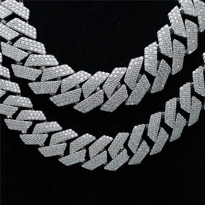 S925 silver Cuban link chain iced with VVS moissanite diamonds showcasing icy brilliance and bold design