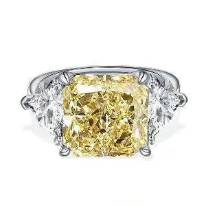The Laurelin Sunstone 10 carat yellow moissanite ring with diamond accents and 14K white gold band
