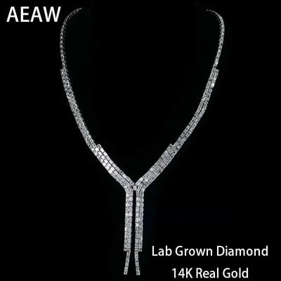 Everdawn Emerald Eternity unisex lab-grown diamond tennis necklace in 14K white gold with radiant emerald-cut stones.