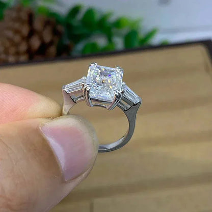 Vow of Eärendil white gold ring with radiant-cut diamond and baguette side stones