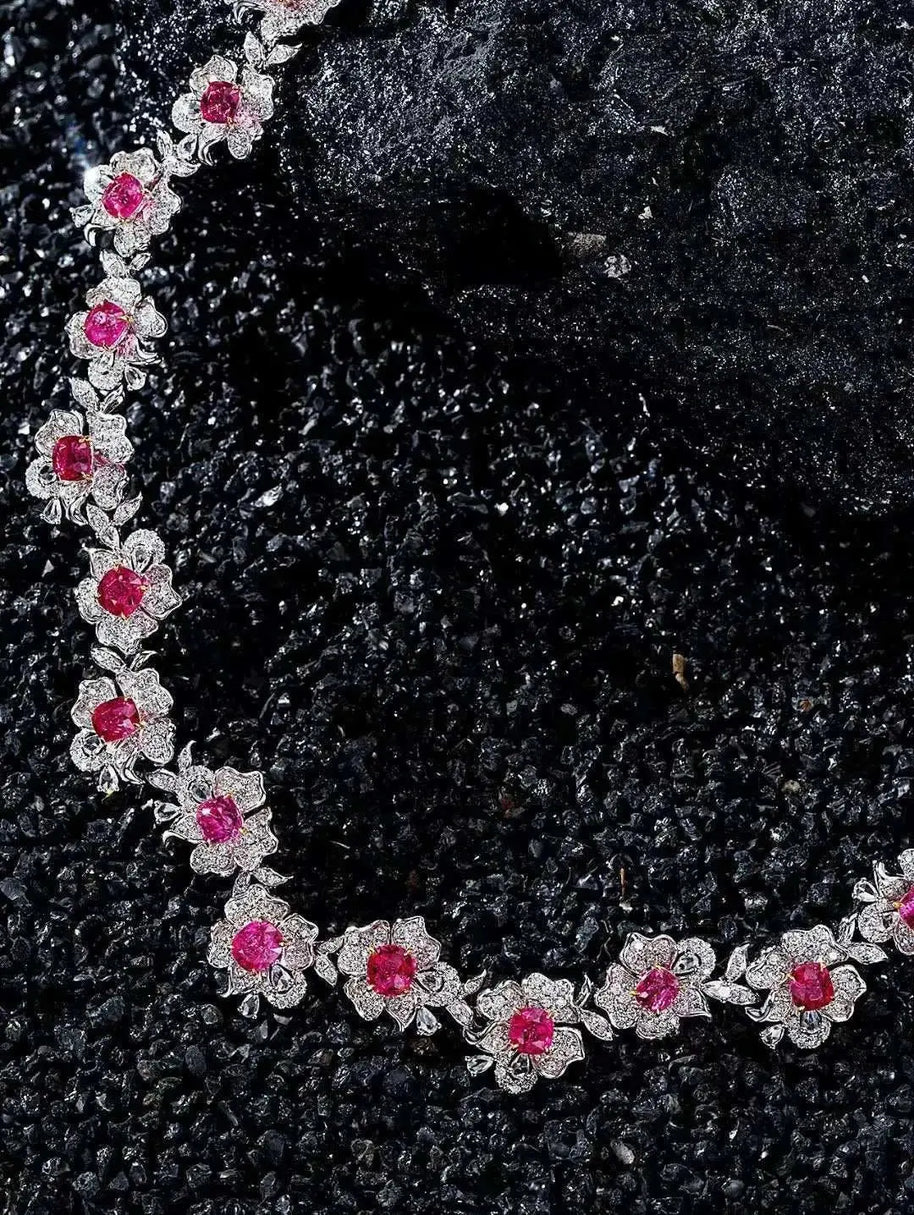 Fine jewelry necklace with 18K white gold, natural spinel, and diamond floral design
