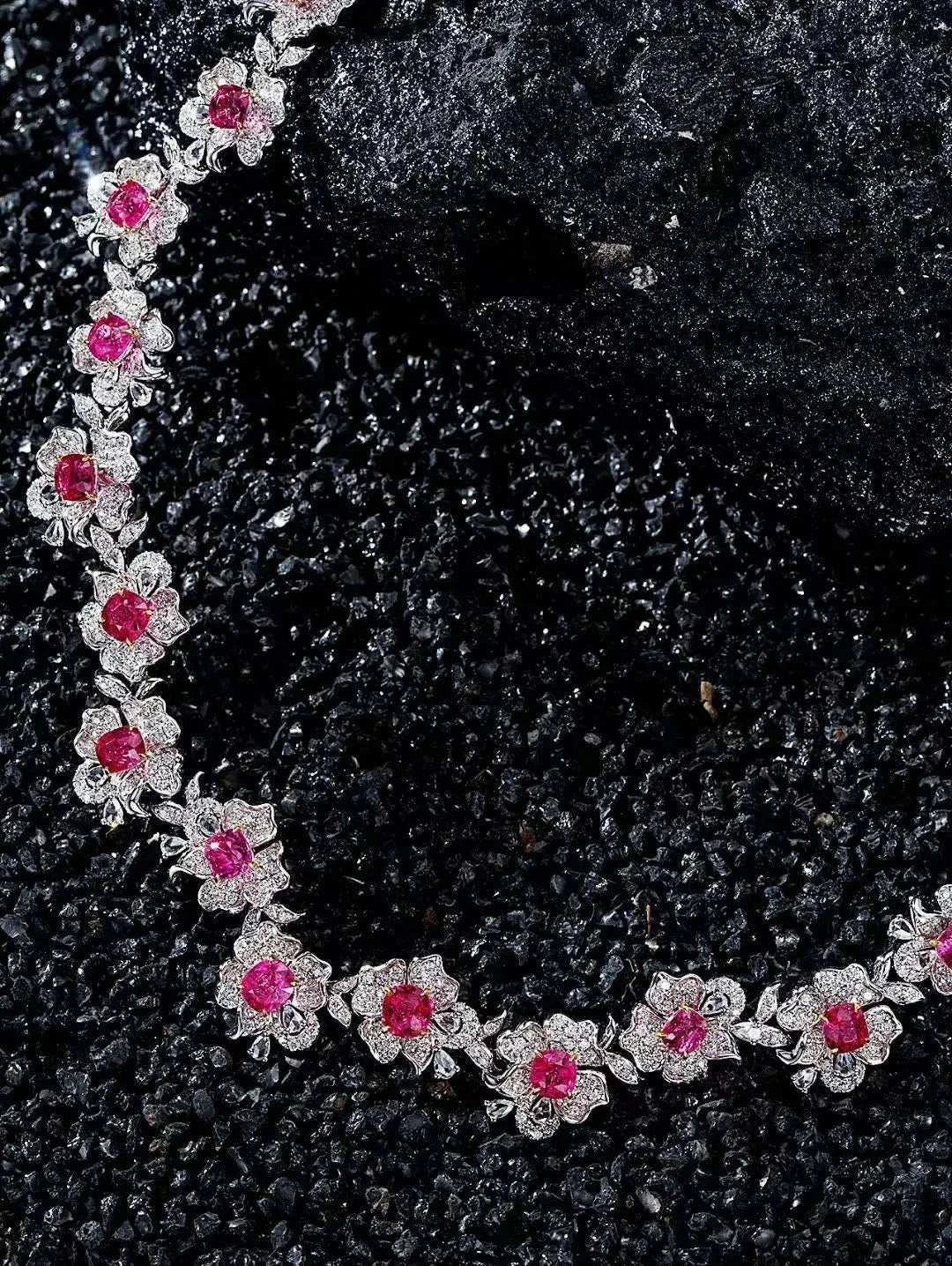 Fine jewelry necklace with 18K white gold, natural spinel, and diamond floral design
